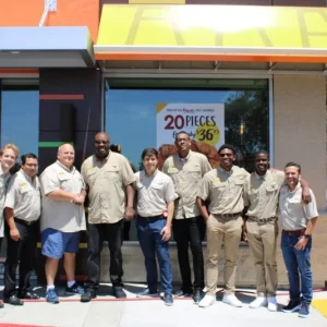 Group of people in front of a fast food restaurant